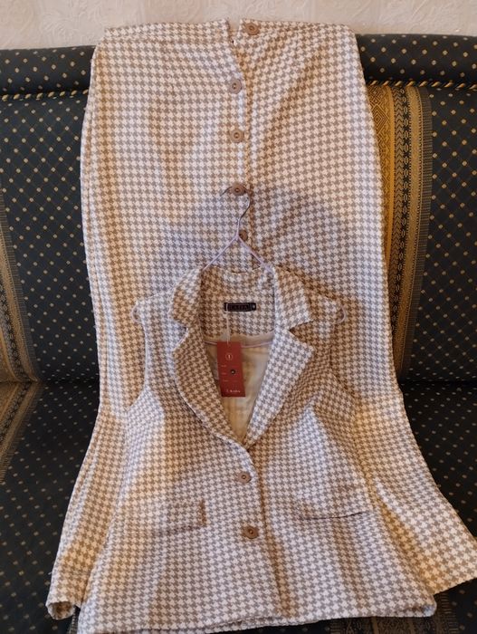 Продам новый костюм