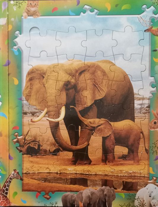 Продается книга с пазлами