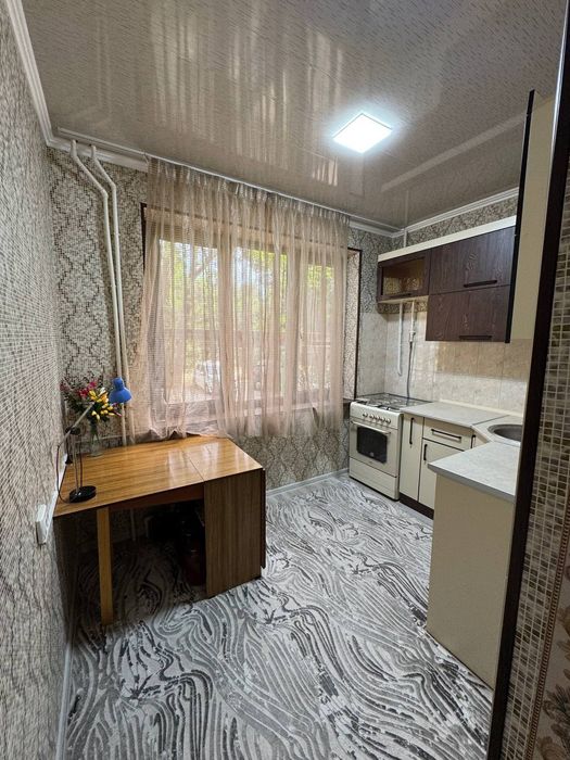 2-мактаб ёнида кв сотилади 2/1/5