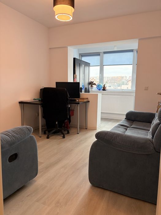 Apartamanet de vanzare cu doua camere decomandate si loc de parcare