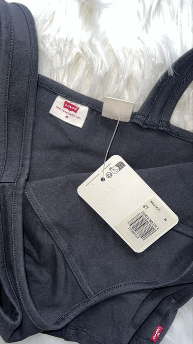 Colanti holografici Guess S si top Levi’s M