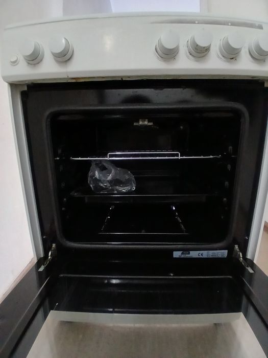 Газ плита новый.