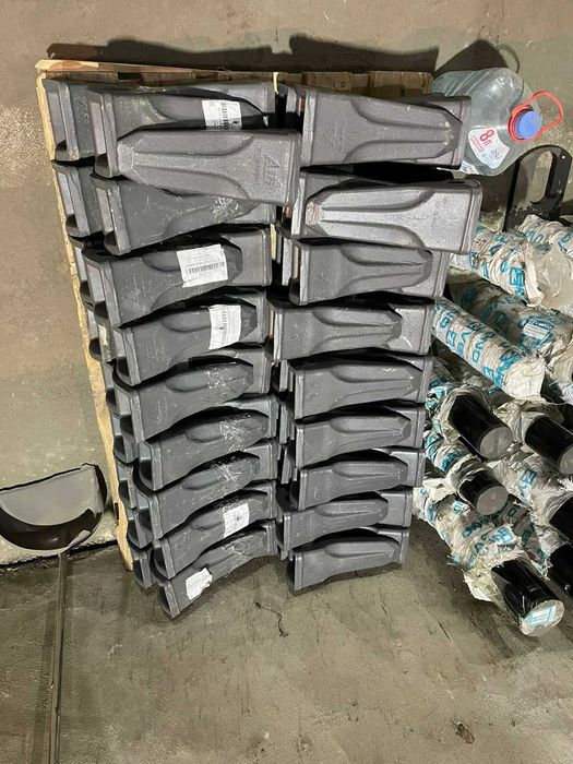 Зубья,адаптеры,фиксаторы,коронки