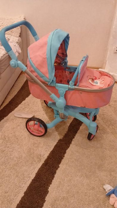 Игрушечная детская коляска