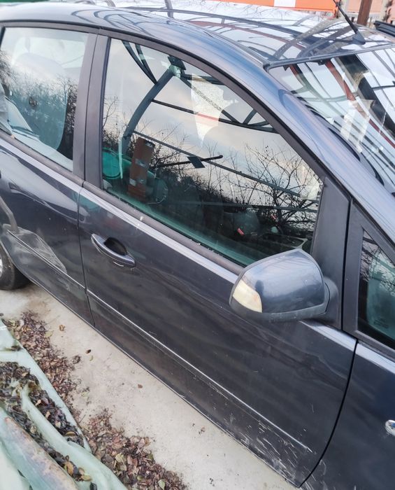 vînd portiere Ford C max an 2009