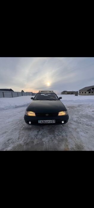 Тайота  Карина е