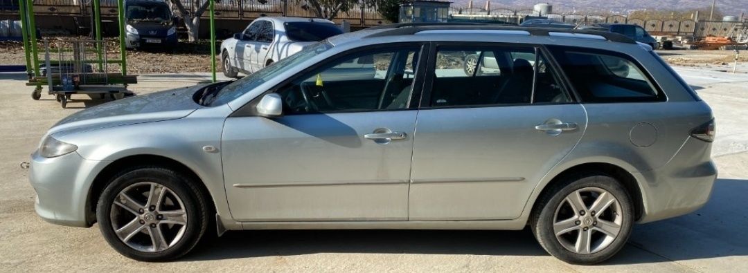 Мазда 6 фейслифт 2.0D  121  BOSE