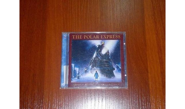 Продам cd The Polar Express, Status Quo, Annie Lennox