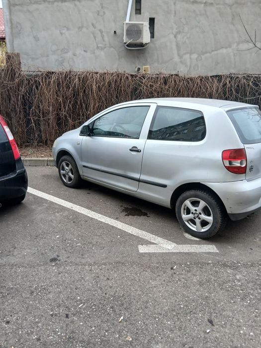 VW FOX fara rugina