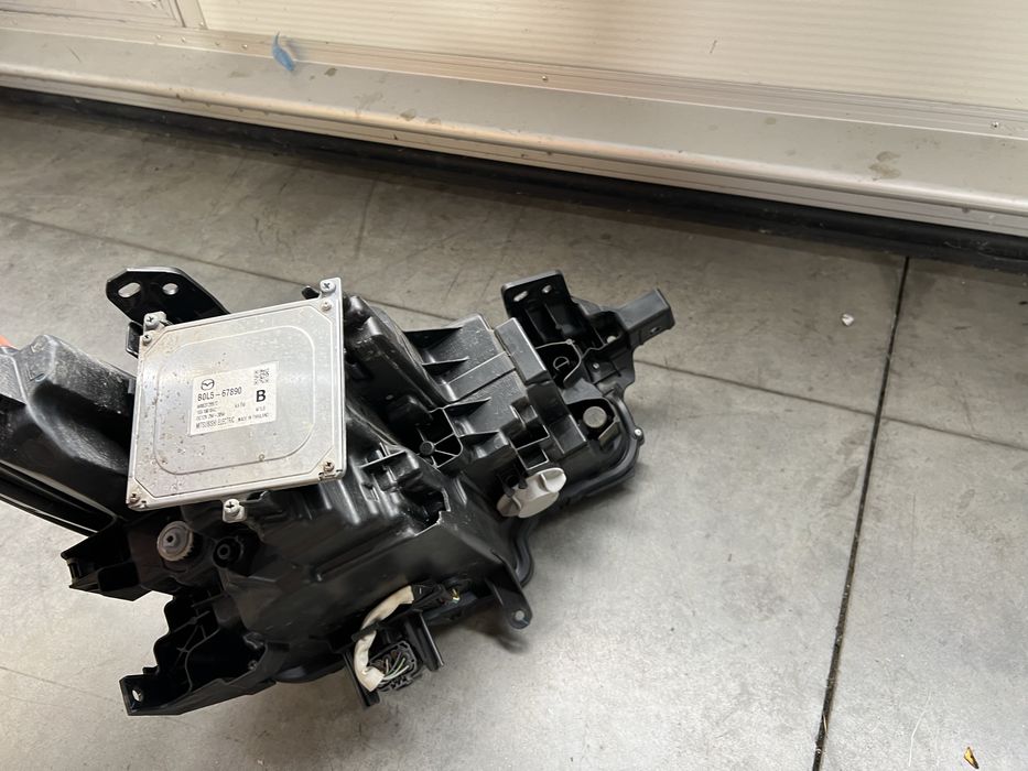 Far stanga MAZDA 3 - cod BCPW 51 040H