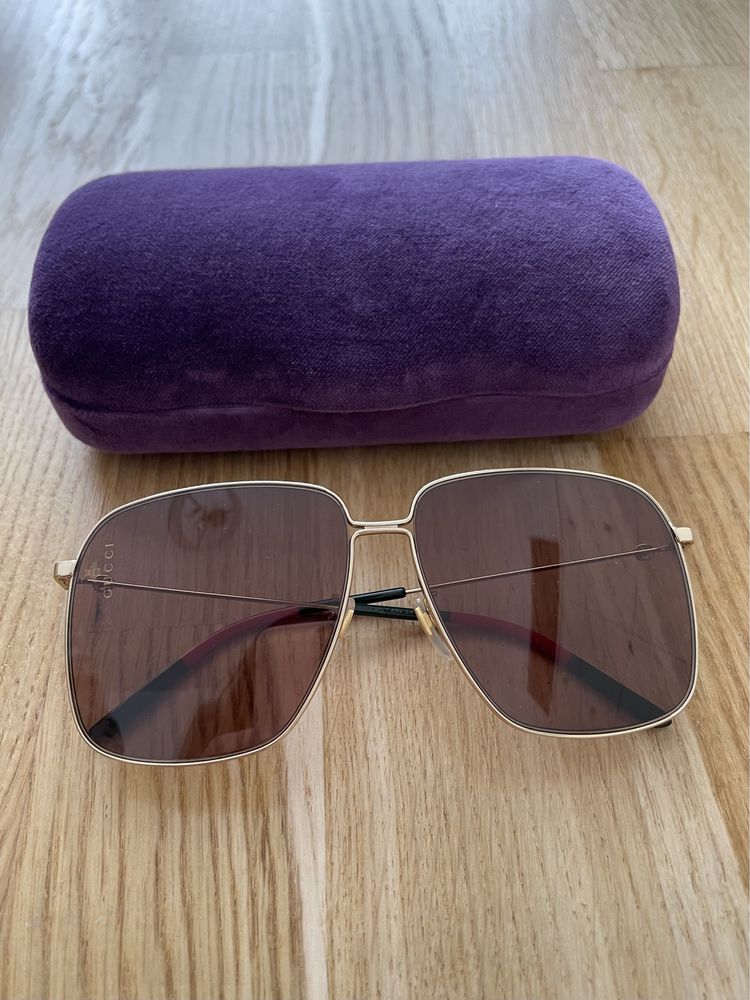 Ochelari Gucci cu rama aurie