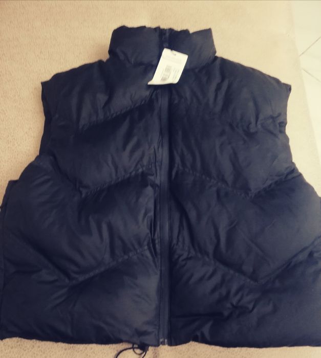 Продам жилетку новая