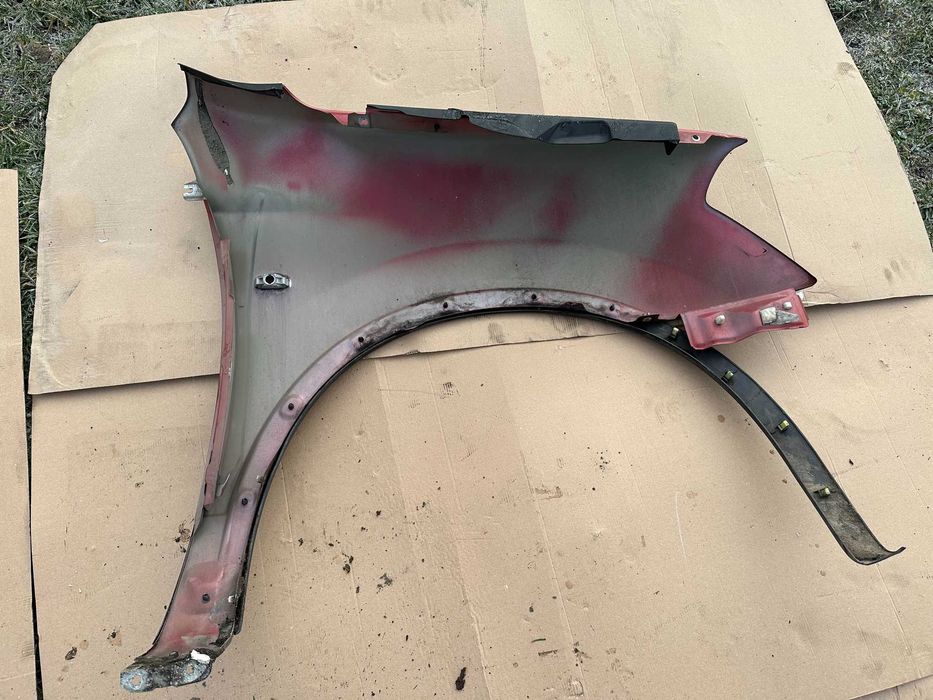 Aripa stanga / dreapta fata Nissan Qashqai culoare rosu