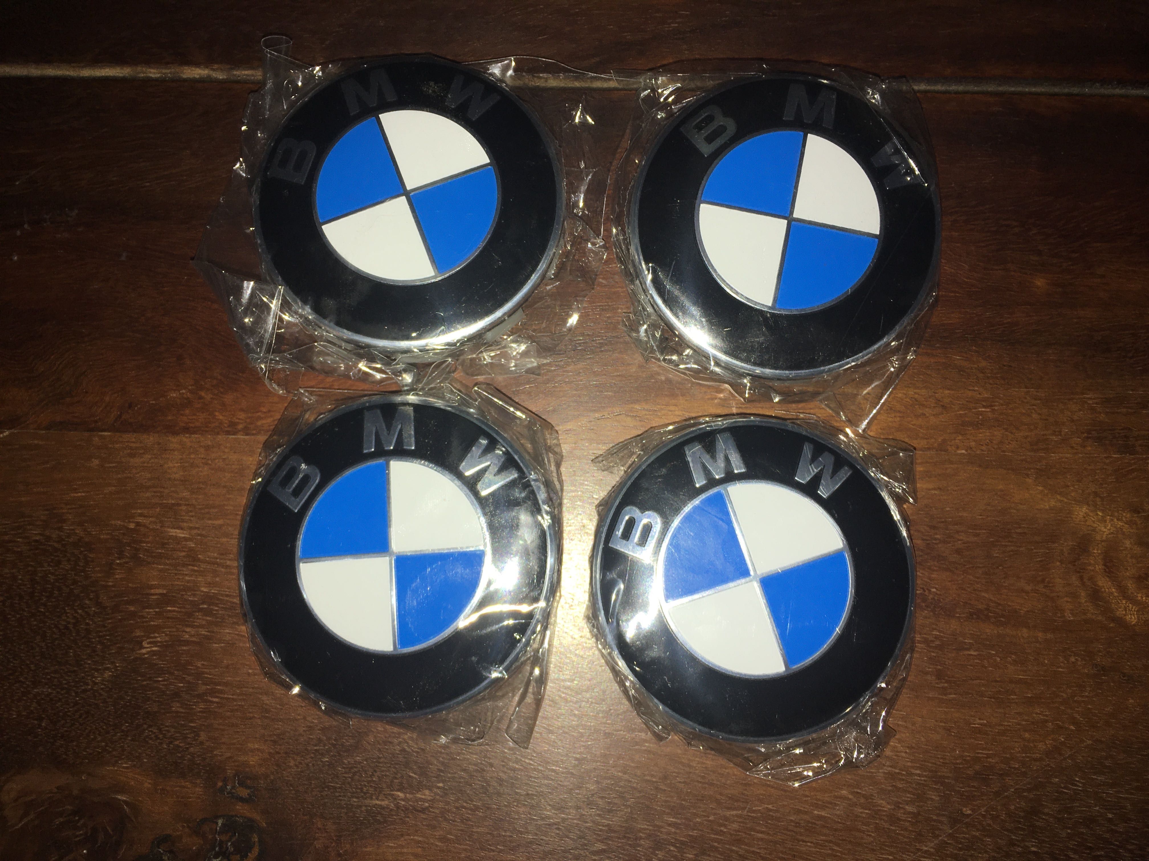 Emblema BMW Seriile 1-8 X1-X6 fata,spate,74,82mm,capace jante