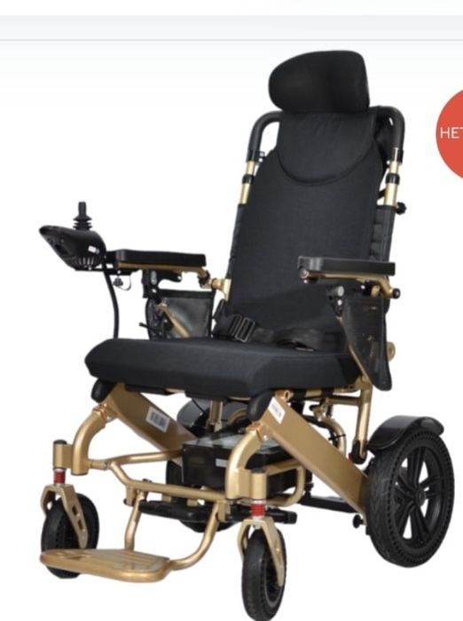 коляска с электроприводом для людей с ограниченным движением.