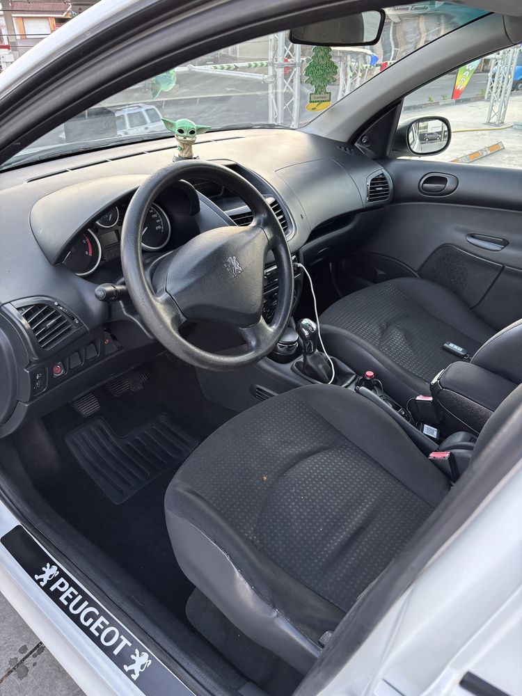 peugeot 206-plus și 2 seturi jante+cauciucuri
