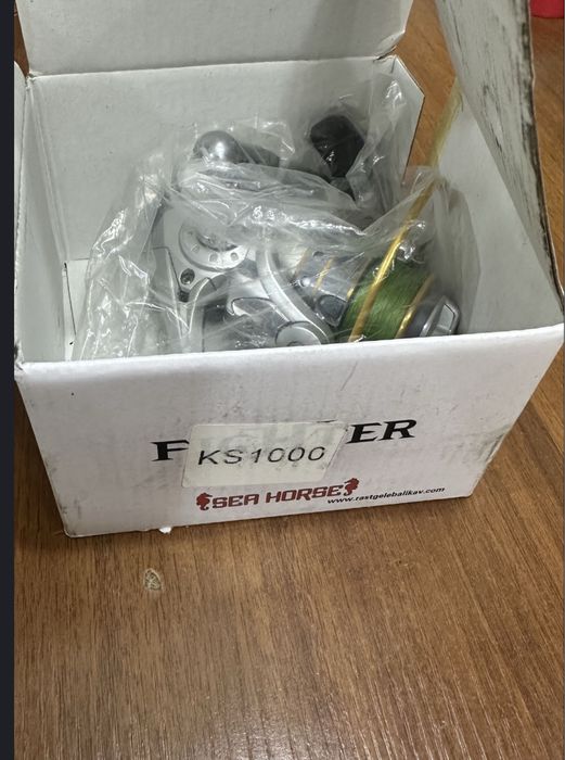 Daiwa Crossfie CS LT 2500-XH. В подарок вторая на фото.