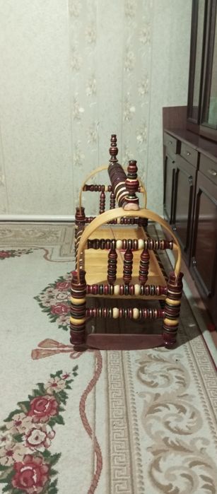 Yog'och beshik yangi