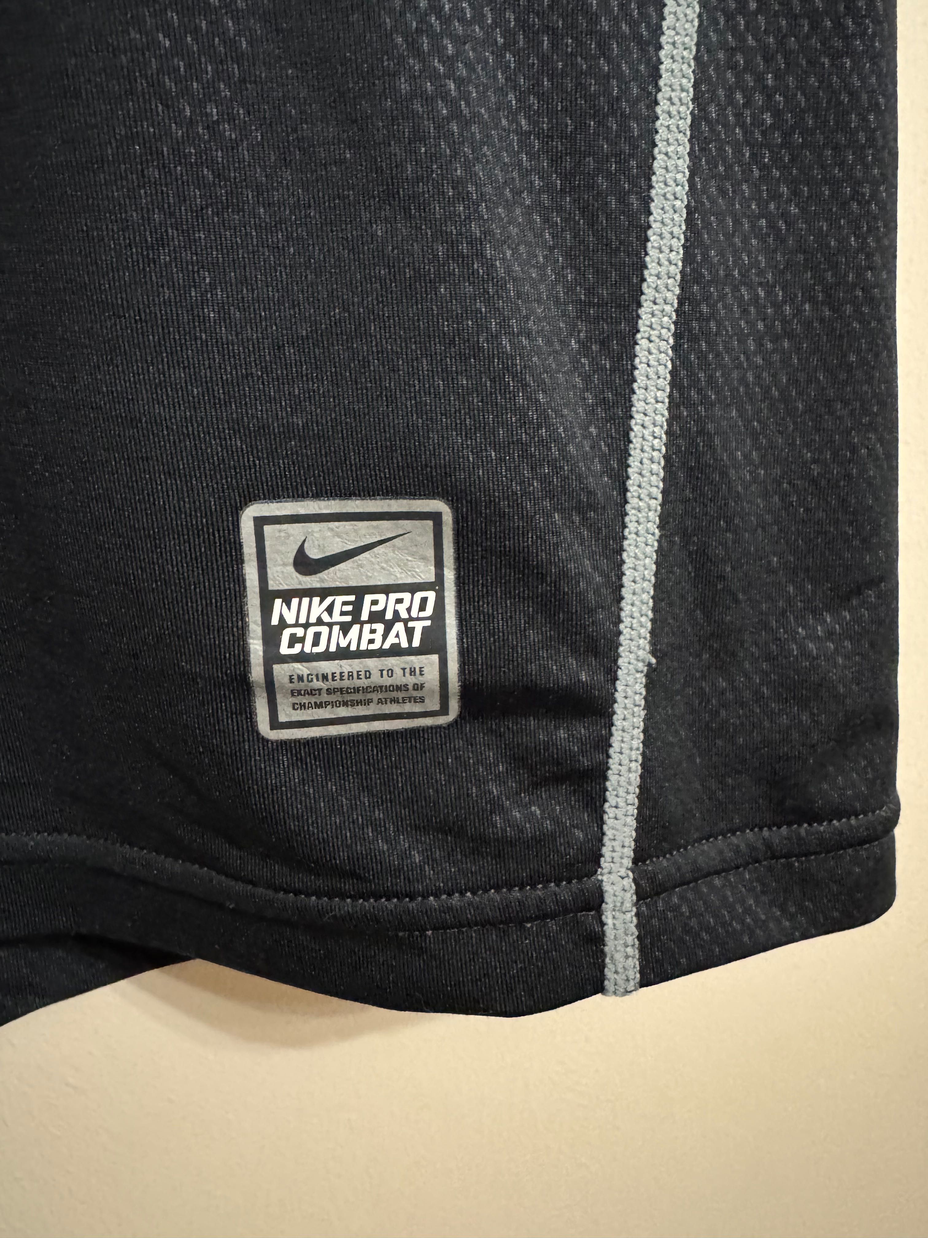 Nike Pro Combat Hypercool Fitted.          Nike Swoosh Tour Center.
