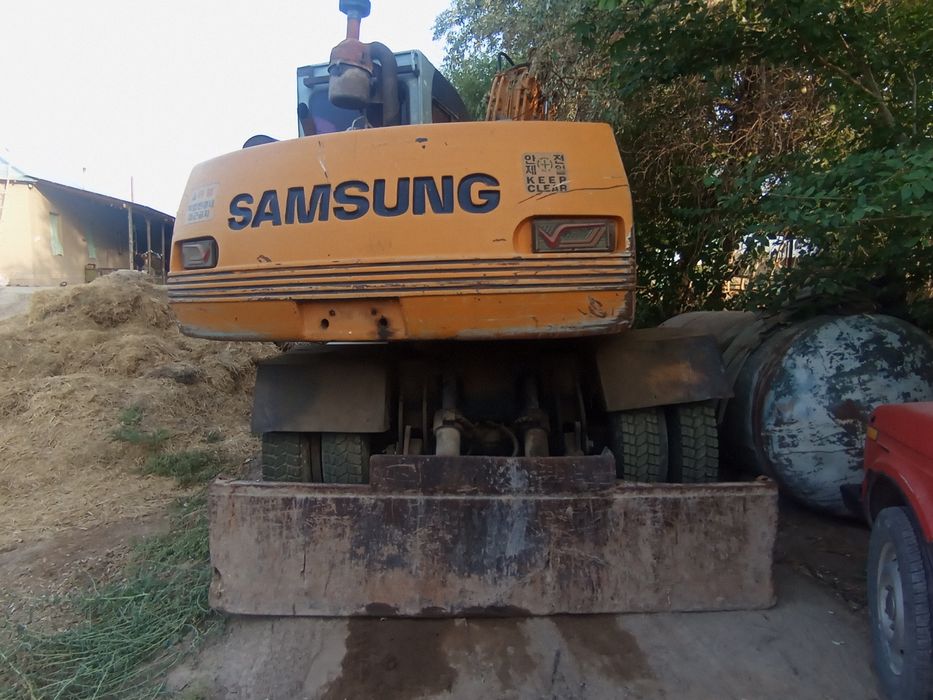 Samsung экскаватор колесный