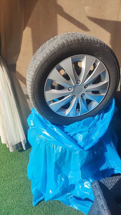 Гуми с джанти 205/55/16 Bridgestone всесезонни ДОТ 2023г.