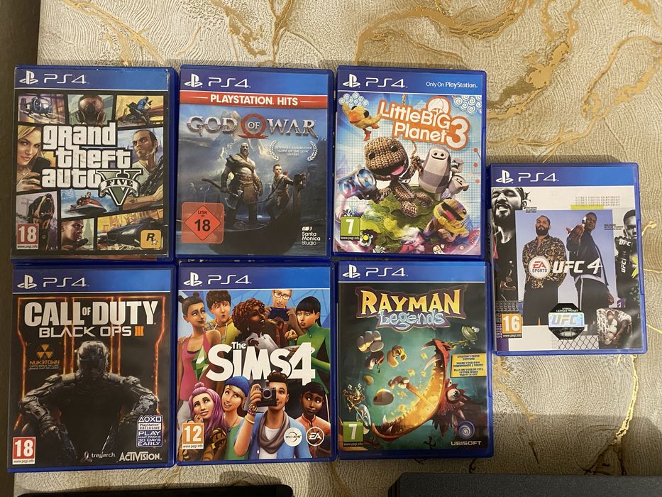 PS4 Pro 1TB + 2 контролера + охлаждаща стойка с зарядно + 7 игри