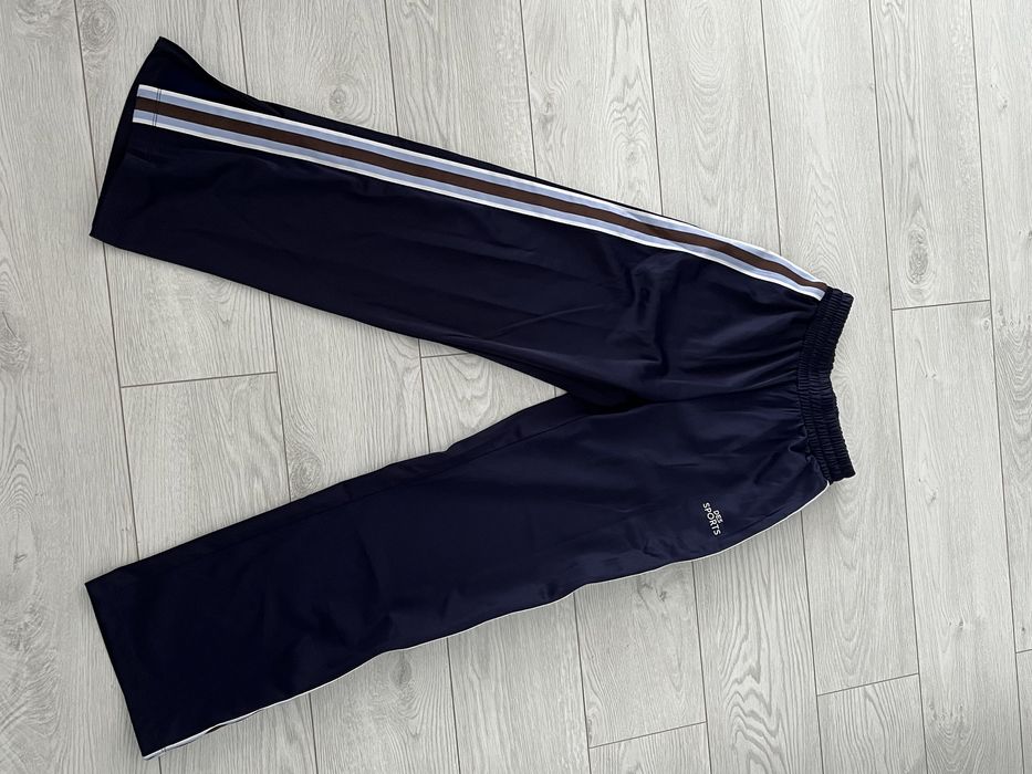 Pantaloni evazati cu fermoar