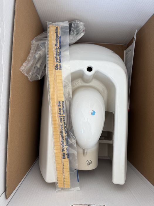 Vas WC rimless Laufen LUA cu capac soft close si clapeta actionare WC