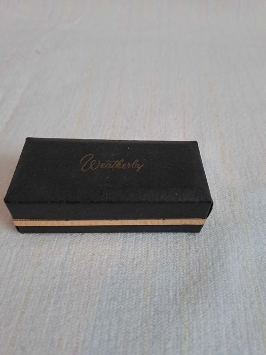 ac de cravata Weatherby gold rifle anii 1950