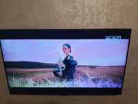 Televizor led Smart android Samsung cu diagonala de 110 cm.