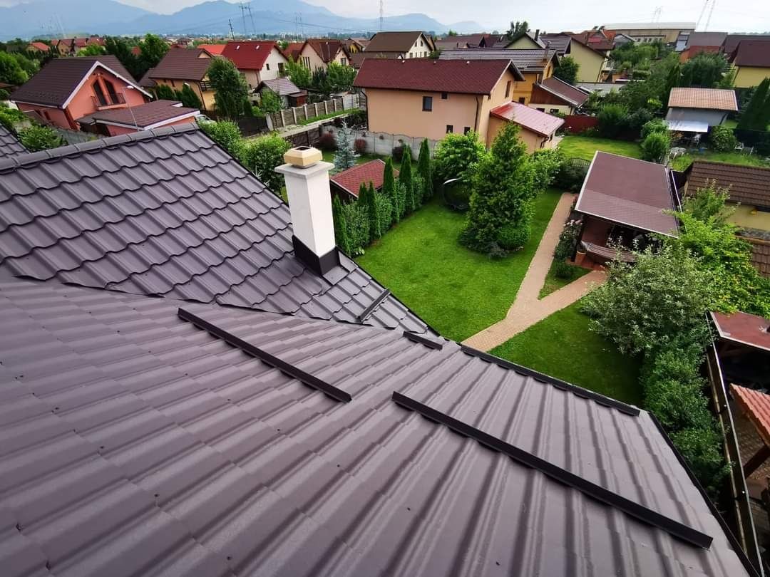 Executam acoperisuri cabane din lemn terase montaj tigla metalica