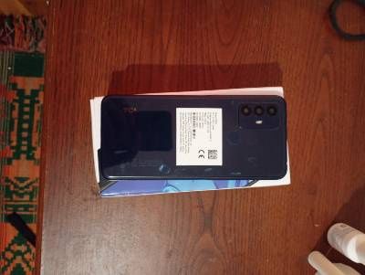 Телефон TCL 305,