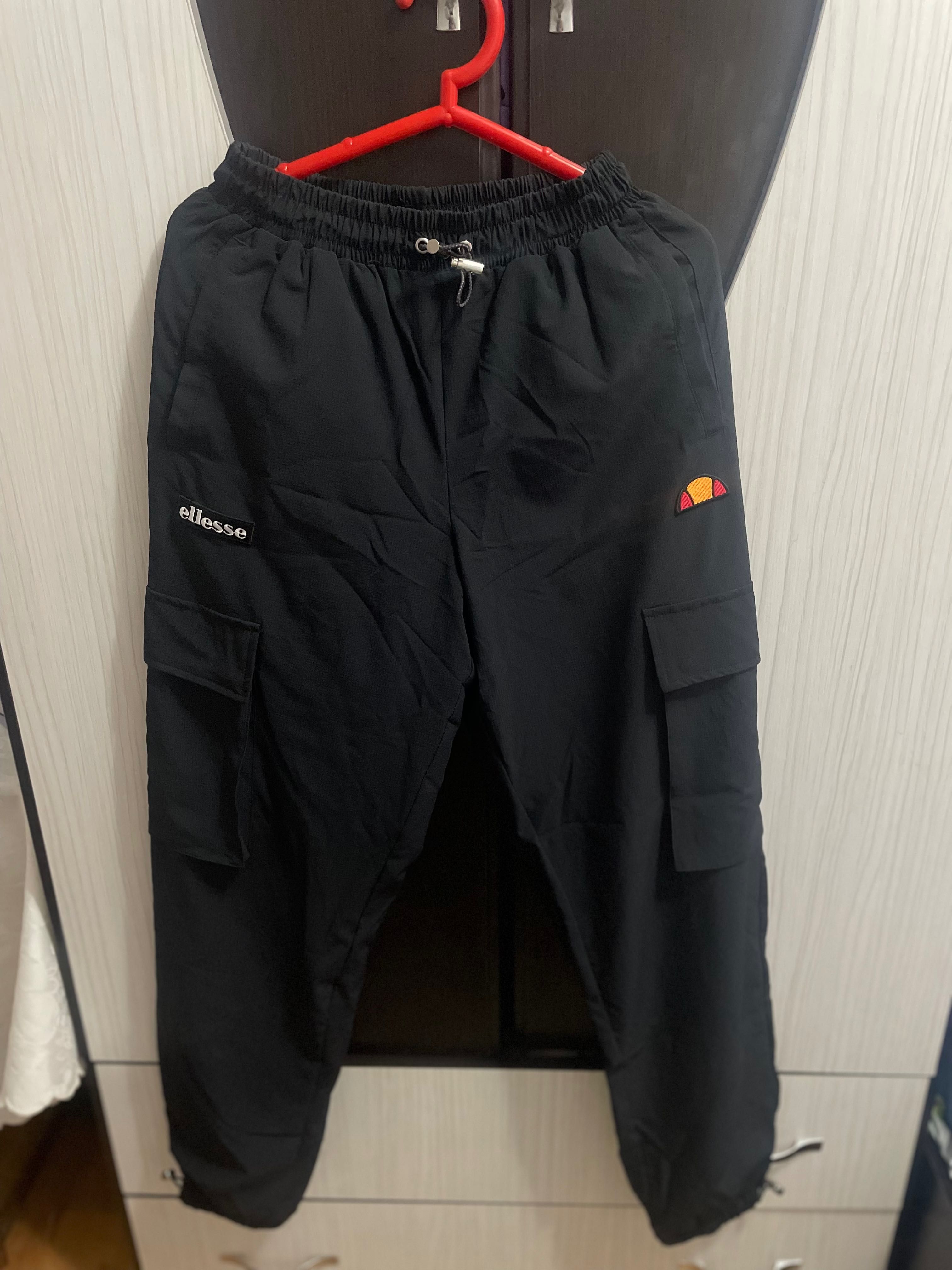 Pantaloni Nike și Ellesse