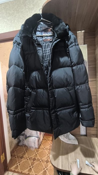 Продам мужской пуховик новый
