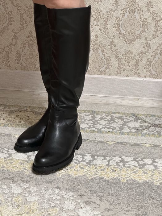 Продам зимние сапоги новые