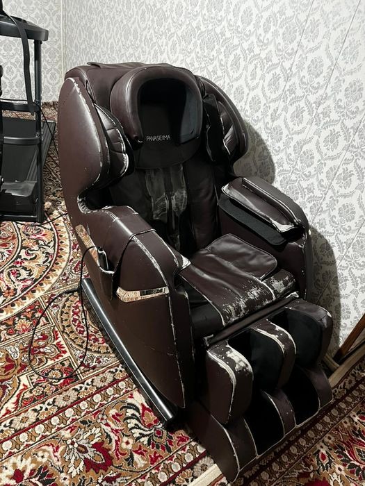 Массажный кресло