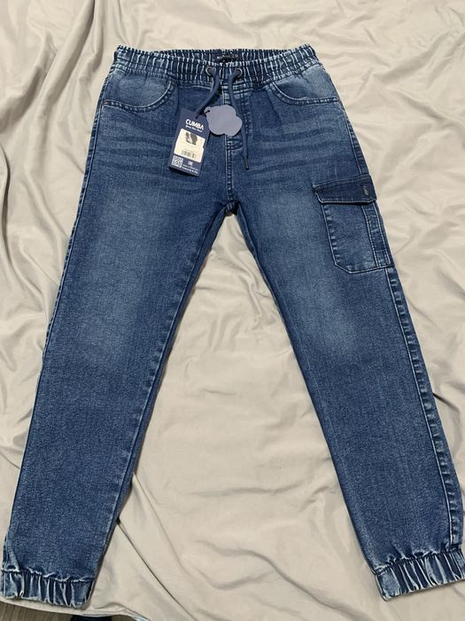 Джинсы новые на мальчика 8-9 лет
