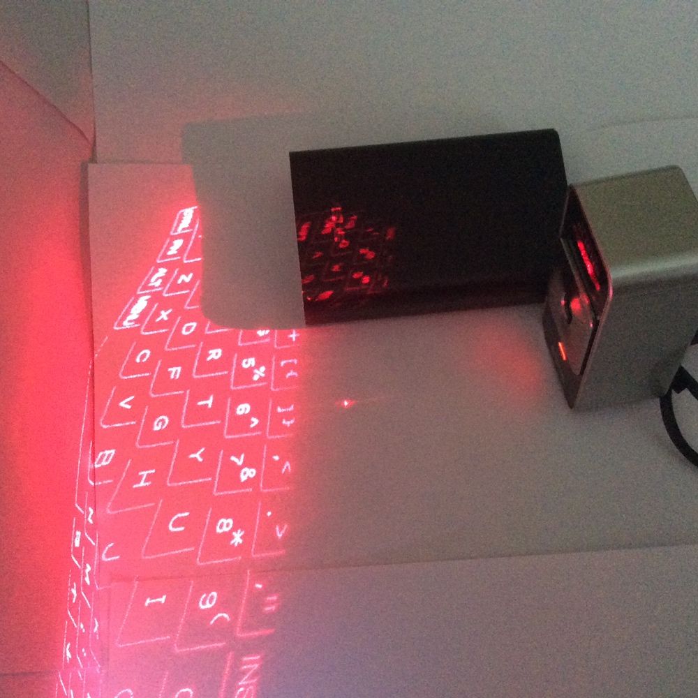 Celluon Tastatura bluetooth laser Virtuala Magic Cube Cellulon