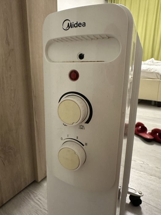 Продам обогреватель Midea