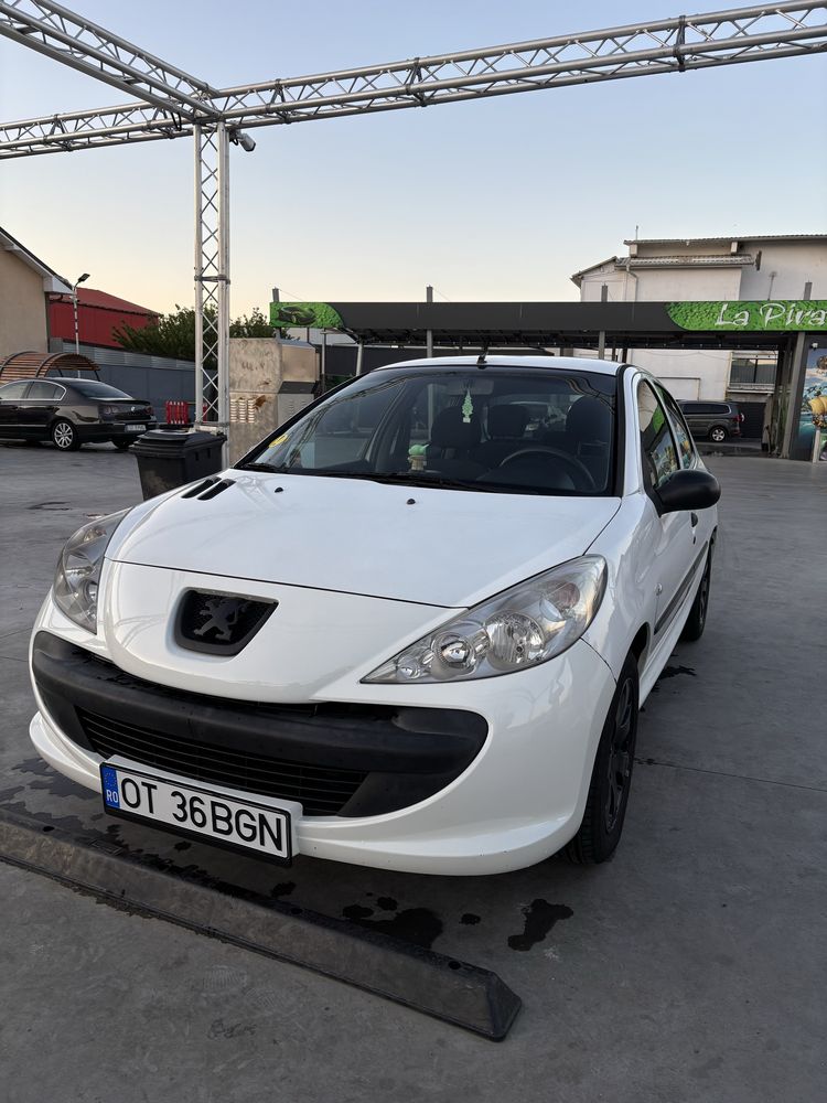 peugeot 206-plus și 2 seturi jante+cauciucuri