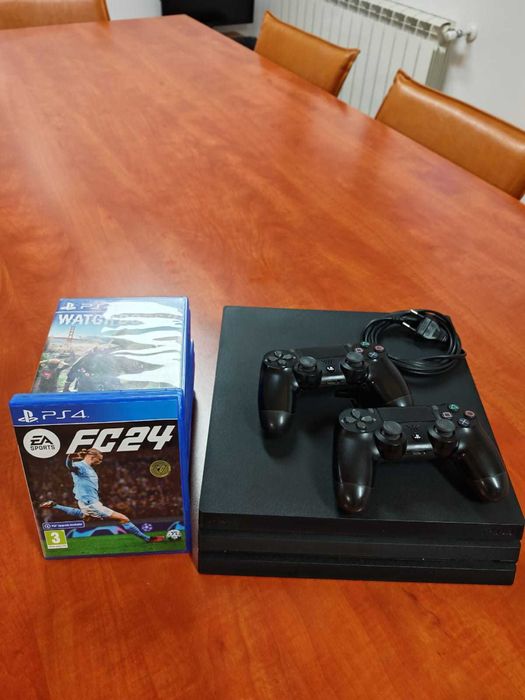 PlayStation 4 Pro 1TB cu 2 controllere și jocuri – stare foarte bună