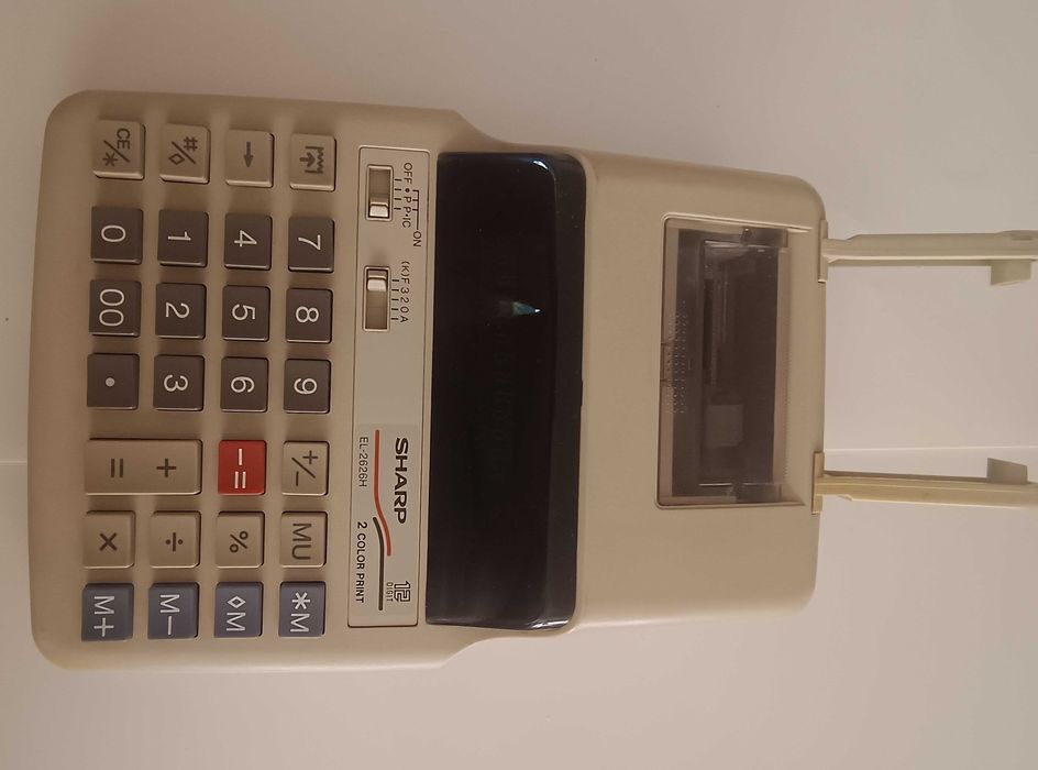 SHARP EL-1750V
Calculator de birou cu imprimare Sharp