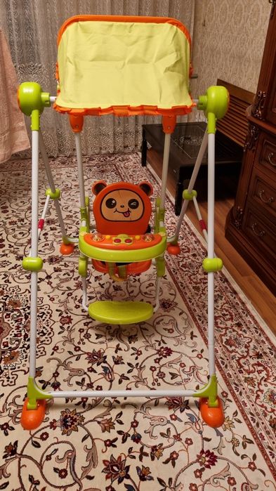 Детская качеля музыкальная