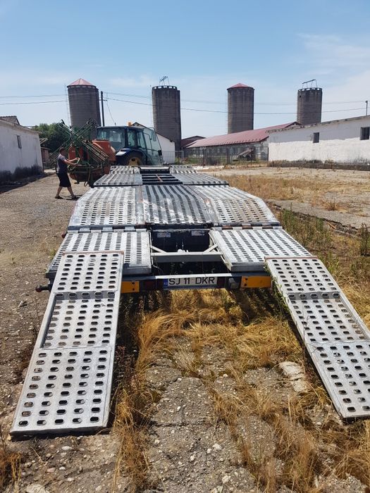 Platforma trailer transportor camioane utilaje baloti 3axe