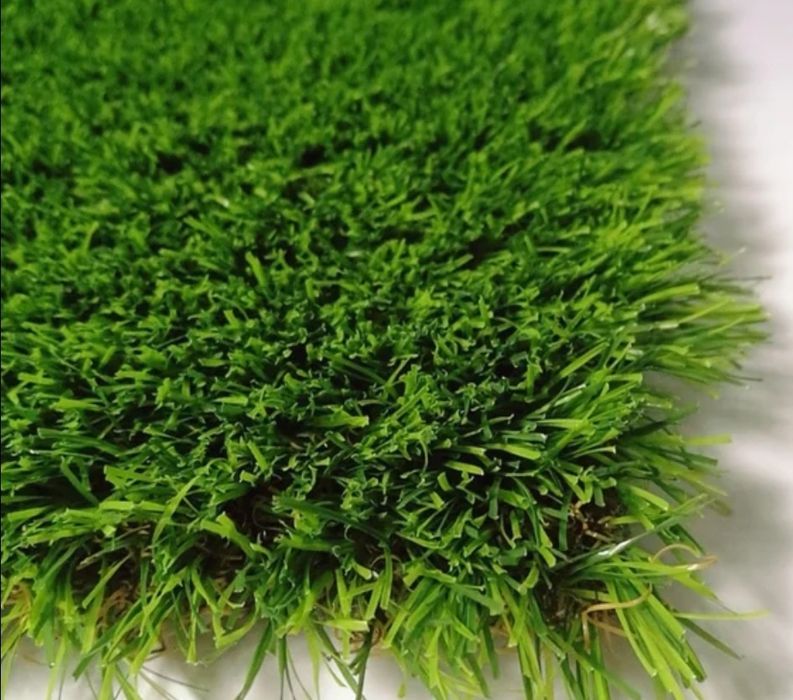 Искусственный газон и тартановое покрытие монтаж