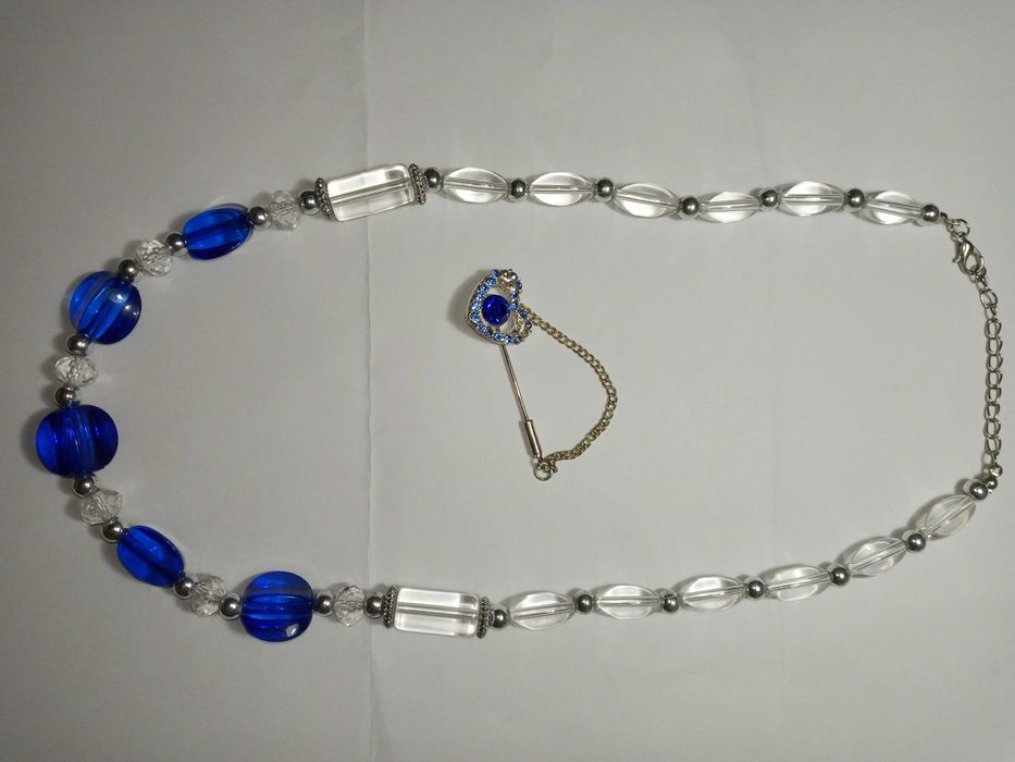 Украшение ожерелье, серьги и брошь.Цена 80 тыс за все