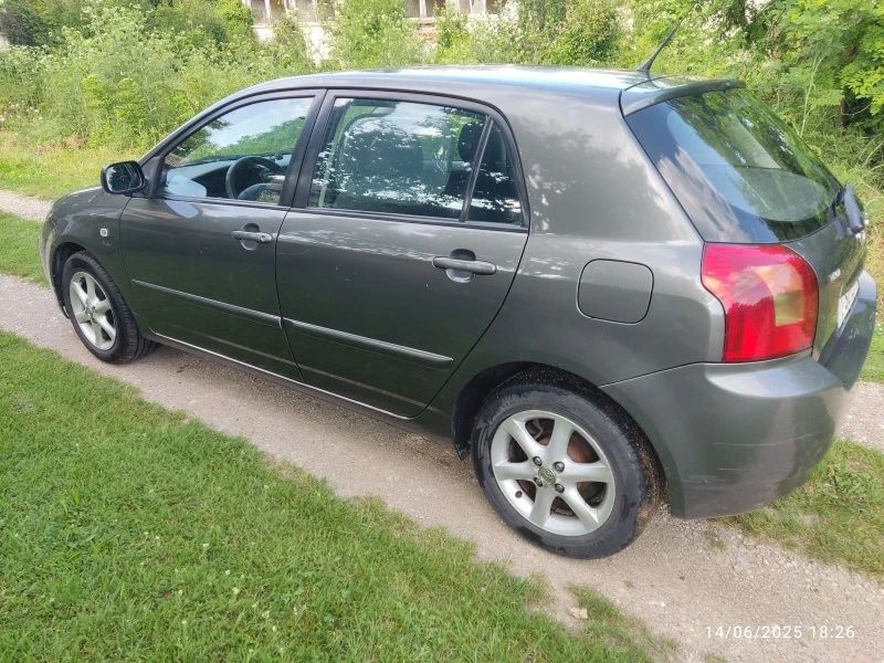 Тойота Corolla 2003