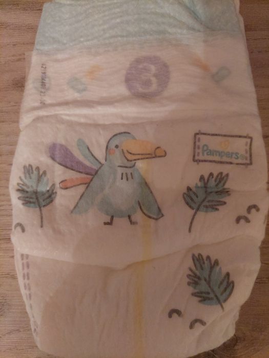 Продам 12 подгузников Памперс 3 на 6-10 кг
