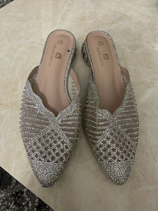 Тапочки новые тошли