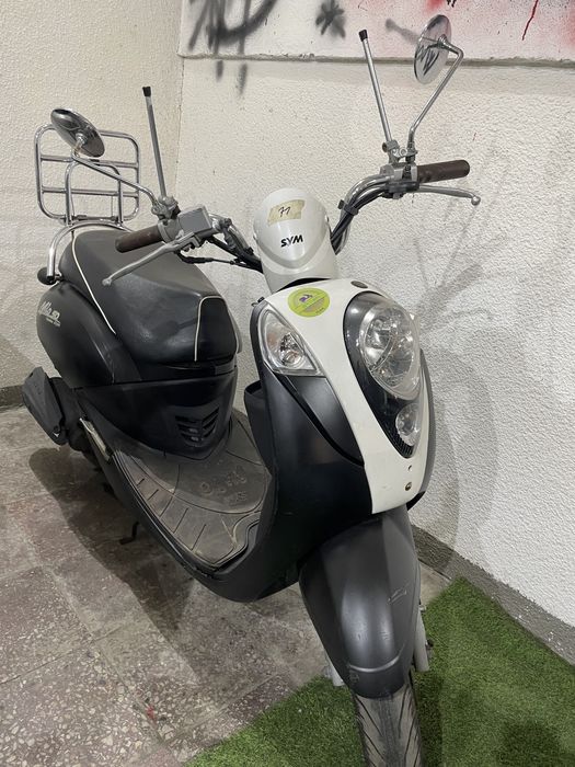 Scuter pe benzina 25km/h